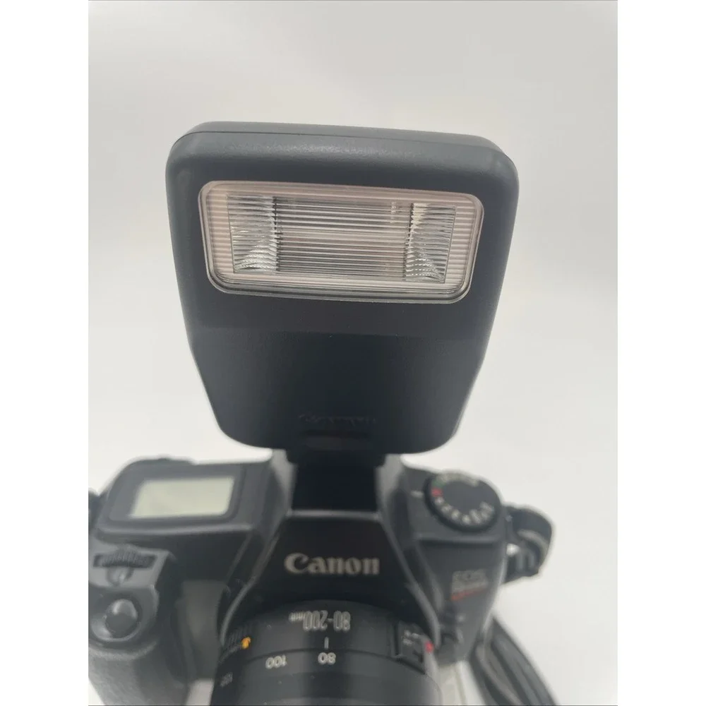 Canon EOS Rebel DSLR Camera +Canon 80-200mm Zoom Lens +Canon 200E Flash+Battery